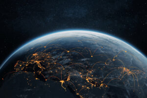 Amazing planet Earth from space showing a dense global network of orange glowing lines connecting. Business and finance, concept. Global communications system and the World Wide Web. Technologies